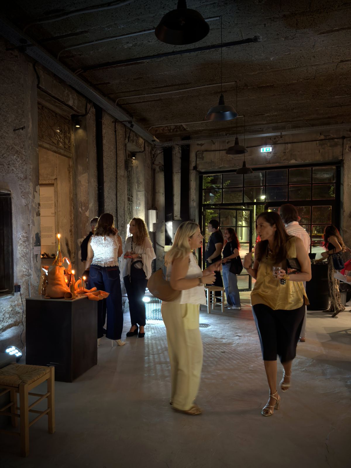 Visitors in the industrial hall, .sympan, 2026